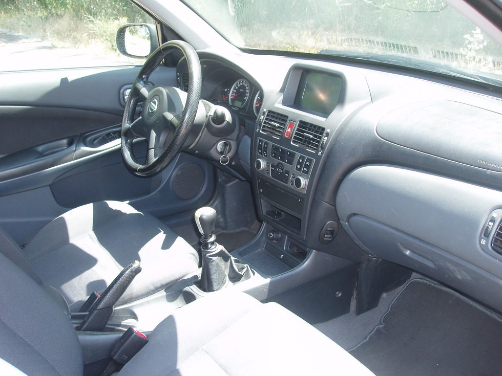 Nissan almera n16 салон